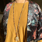 Load image into Gallery viewer, Hand-knotted necklace with fluorite and rock crystal tip
