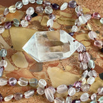 Load image into Gallery viewer, Hand-knotted necklace with fluorite and rock crystal tip
